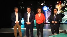 Los candidatos antes de comenzar el debate.