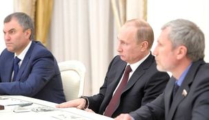 Aleksey Zhuravlyov junto a Vladimir Putin.