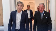 Daniel Funes de Rioja junto a Luis Caputo.