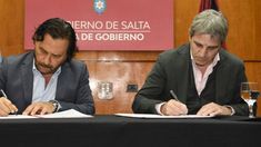 Gustavo Sáenz junto a Luis Caputo.