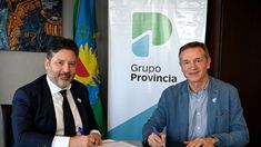 El presidente del Grupo Provincia, Gustavo Menéndez y el Secretario General del Sindicato del Seguro, Jorge Sola. Foto Prensa