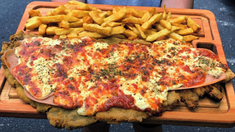 En Turf hay desde la clásica milanesa de ternera hasta opciones más innovadoras. En Turf hay desde la clásica milanesa de ternera hasta opciones más innovadoras.