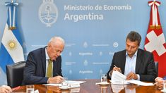 Hans Ruedi Bortis junto a Sergio Massa.