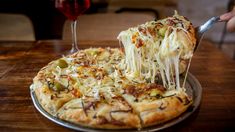 La pizza, una de las comidas más consumidas en todo el mundo. La pizza, una de las comidas más consumidas en todo el mundo.