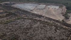 Vista aérea de uno de los basurales en Santiago del Estero, donde se desarrollará un centro ambiental. Vista aérea de uno de los basurales en Santiago del Estero, donde se desarrollará un centro ambiental.