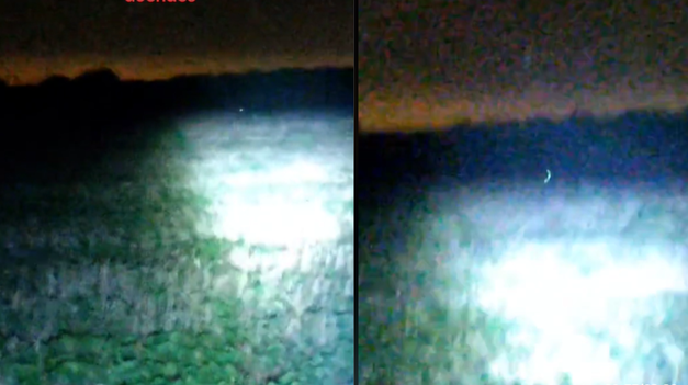 Captura del video donde se puede ver una luz a lo lejos, lo que pareciera ser un duende.&nbsp;