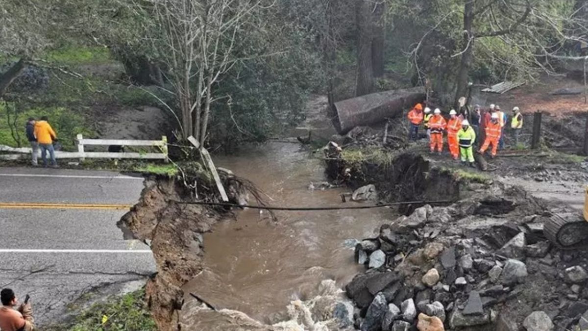 A storm breaks a dam and kills at least two people in California