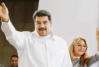 Nicolás Maduro y Cilia Flores. Nicolás Maduro y Cilia Flores.
