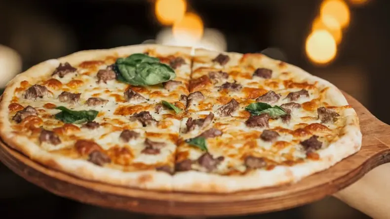 Esta pizzería rinde homenaje a los clásicos de la cocina italiana-argentina.