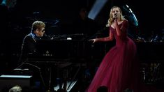 Elton John y Miley Cyrus Elton John y Miley Cyrus