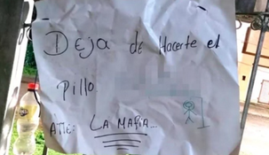Parte de la nota que mencionaba el nombre del agente penitenciario con un dibujo como el del ahorcado.