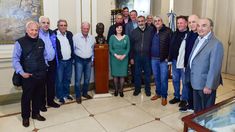 Olmos junto a los referentes de la CGT.