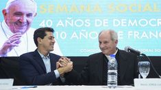 Eduardo Wado de Pedro y el presidente de la Comisión Episcopal de Pastoral Social, Jorge Lugones.