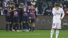 Modric, del Real, sufre la derrota con Barcelona. Modric, del Real, sufre la derrota con Barcelona.