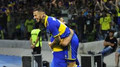 Benedetto se abraza con Figal.