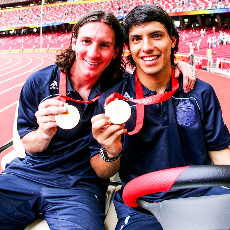 Dos amigos inseparables, disfrutando del oro olímpico.  