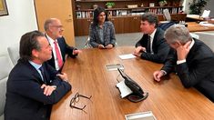 La reunión de Nicolás Posse y Luis Caputo con representantes del FMI.