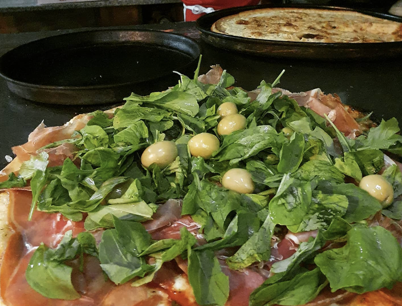 Pizza con rúcula.