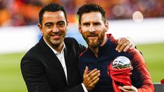 Xavi junto a Messi. Xavi junto a Messi.