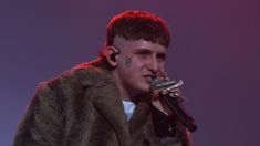 Dillom fue uno de los actos más destacados del primer día del Cosquín Rock. Dillom fue uno de los actos más destacados del primer día del Cosquín Rock.