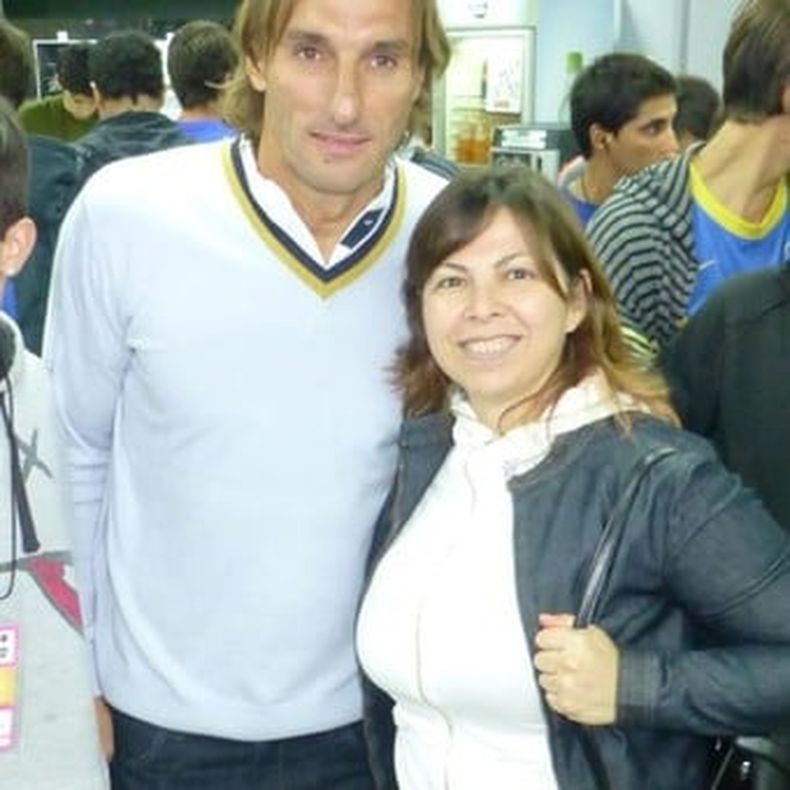 Batakis junto a Rolando Schiavi.